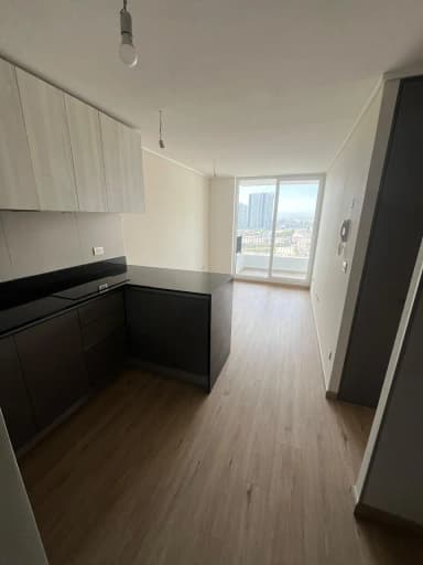 Se arrienda Depto 2 Dorm, 1 Baño con Estac y Bodega, frente a clinica bupa. - foto 1
